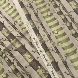Tula Pink Bumble Forest Stripe. Half yard green